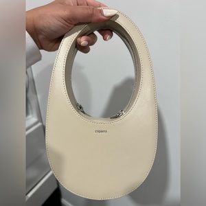 Coperni beige swipe bag